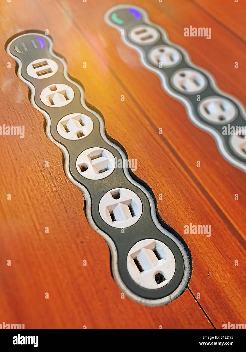 Charging station with linear plug display, USA. - Smartphone Captured Stock Image