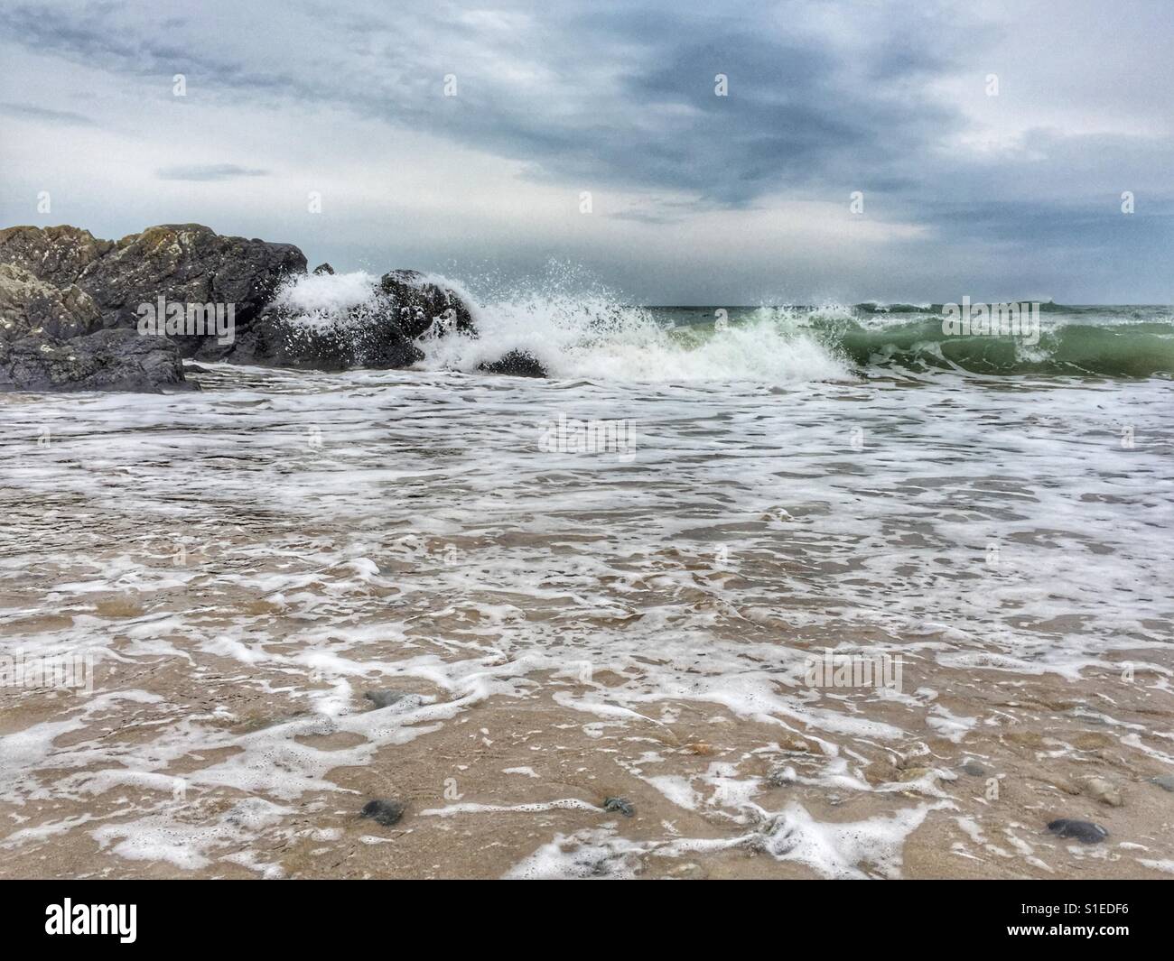 Dramatic sea at shoreline as tide is coming in - Smartphone Captured Stock Image