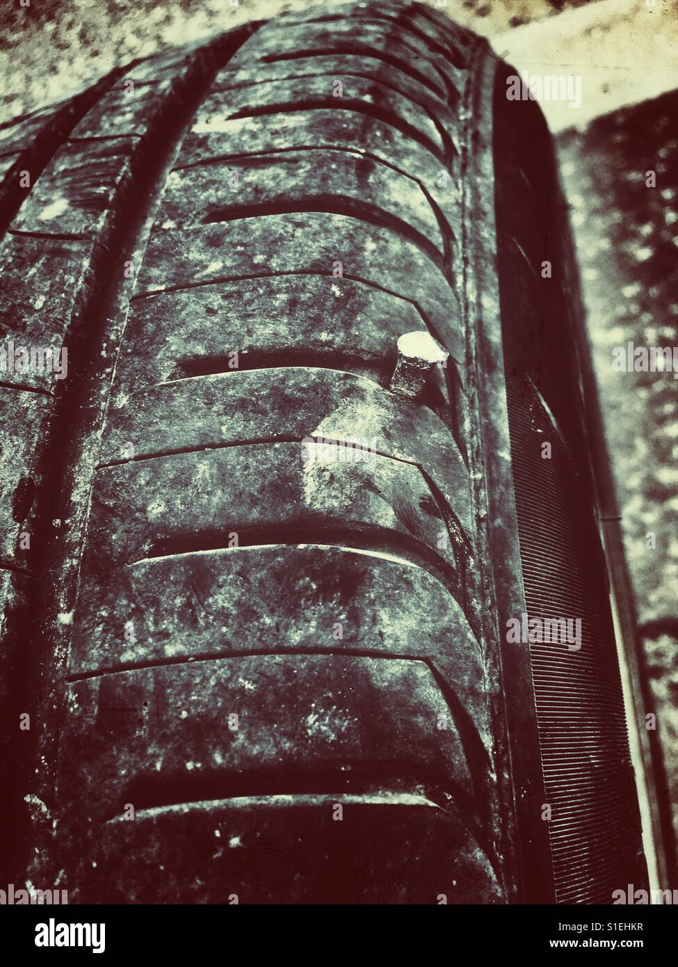 Tyre puncture nail in tyre hires stock photography and images Alamy