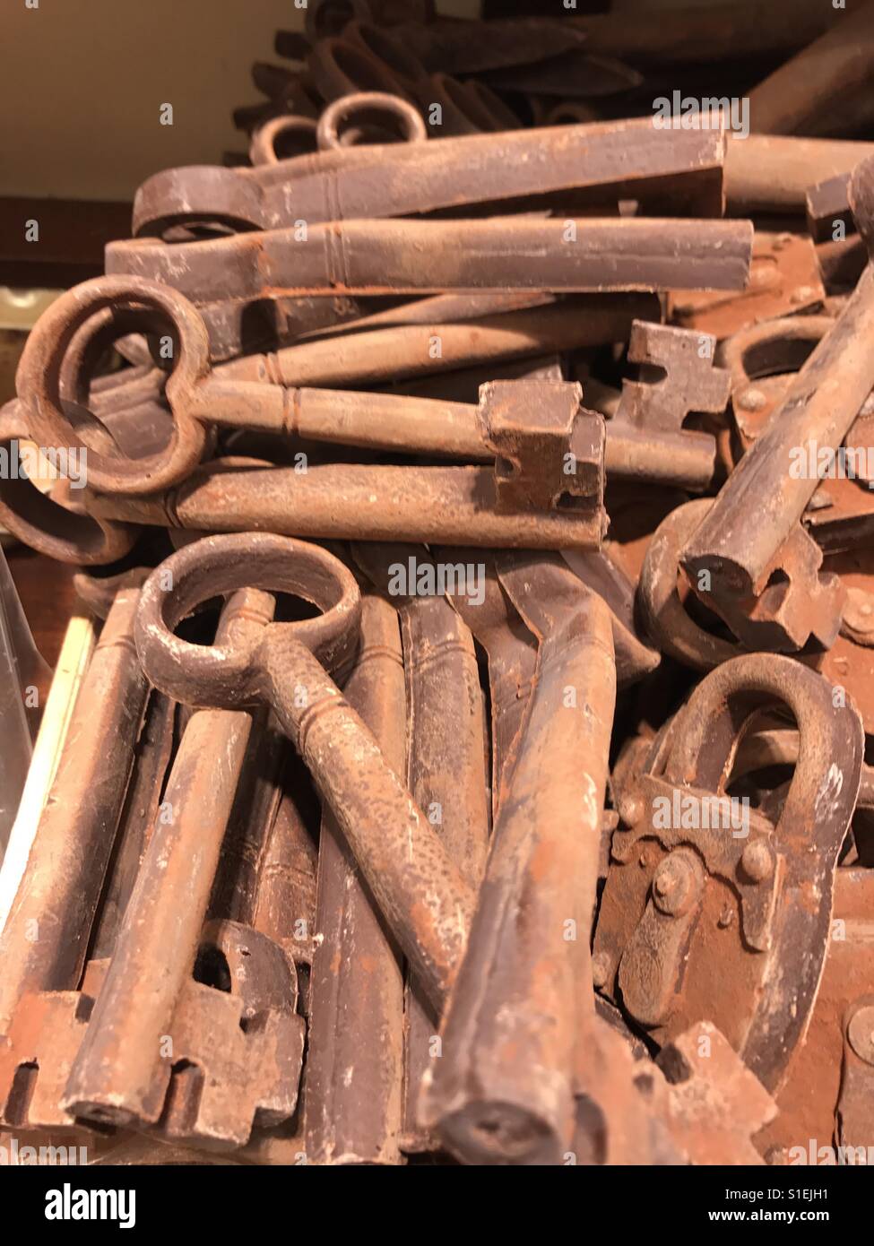 Brussels, Belgium. Revival of the old. One of the interesting edible objects found in Chocolate shops in Brussels are rusty old keys. On closer inspection you find them totally made of chocolate! - Smartphone Captured Stock Image