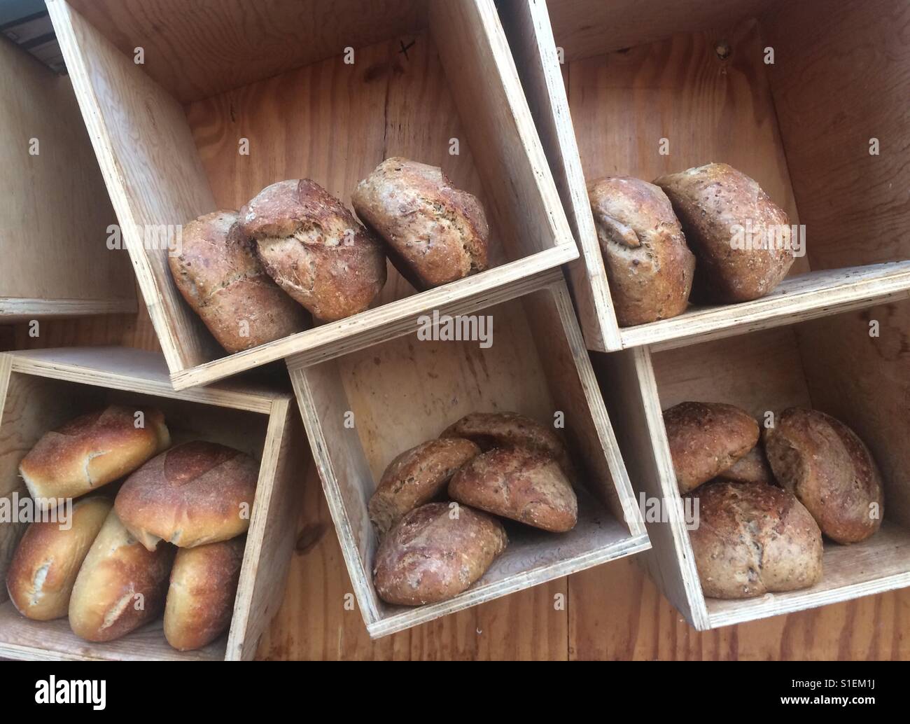 Shelves of bread town mill bakery Lyme Regis Stock Photo