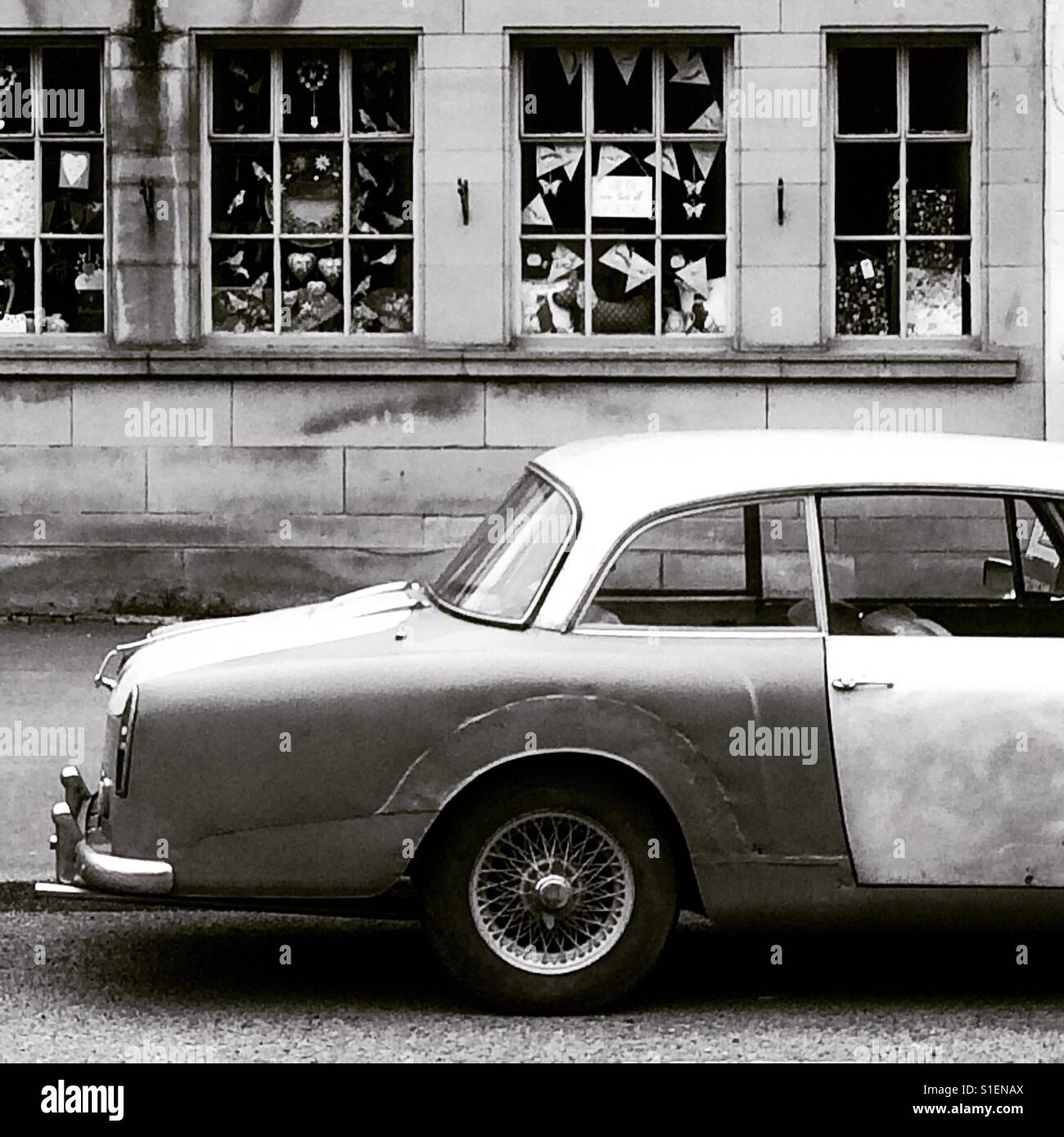 Monochrome image of old car parked on street Stock Photo Alamy