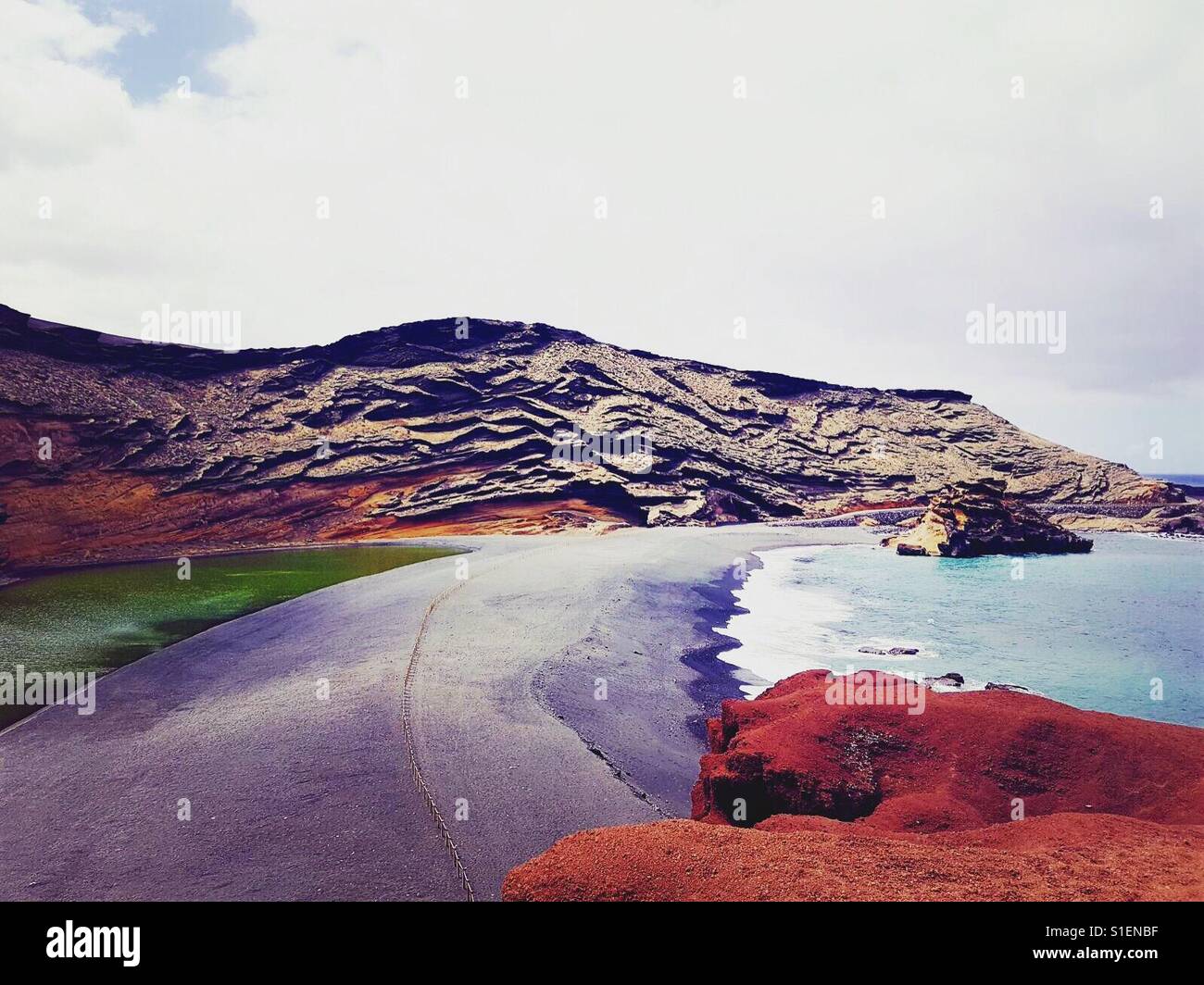 Green lagoon meets shore - Smartphone Captured Stock Image