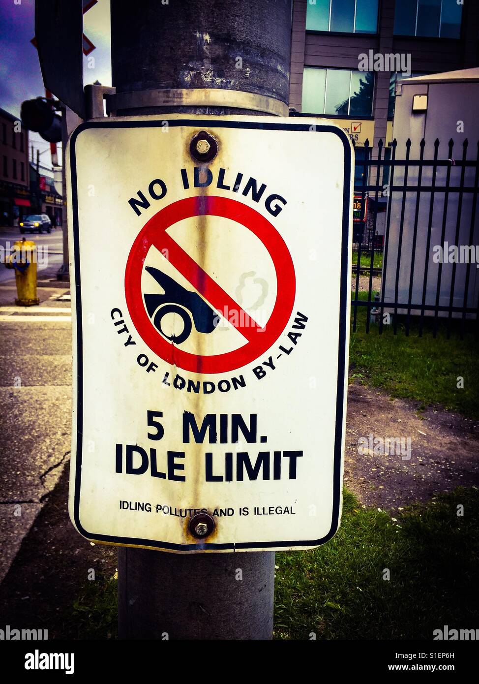 Idling limit. Bad. Carbon footprint. Sign. Bylaw. - Smartphone Captured Stock Image