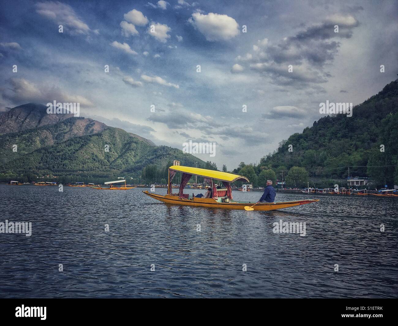 Iconic Shikara ride at Dal Lake in Srinagar, Jammu & Kashmir in northern India. - Smartphone Captured Stock Image