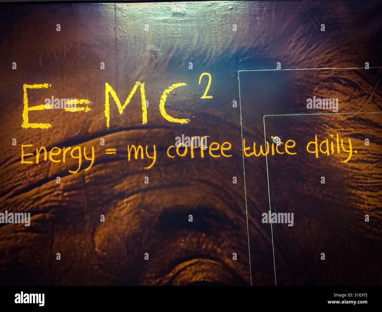 Einstein  clarified. Relativity for dummies. The famous equation repurposed at a café, Ontario, Canada. Unforgettable. Everyday application. - Smartphone Captured Stock Image