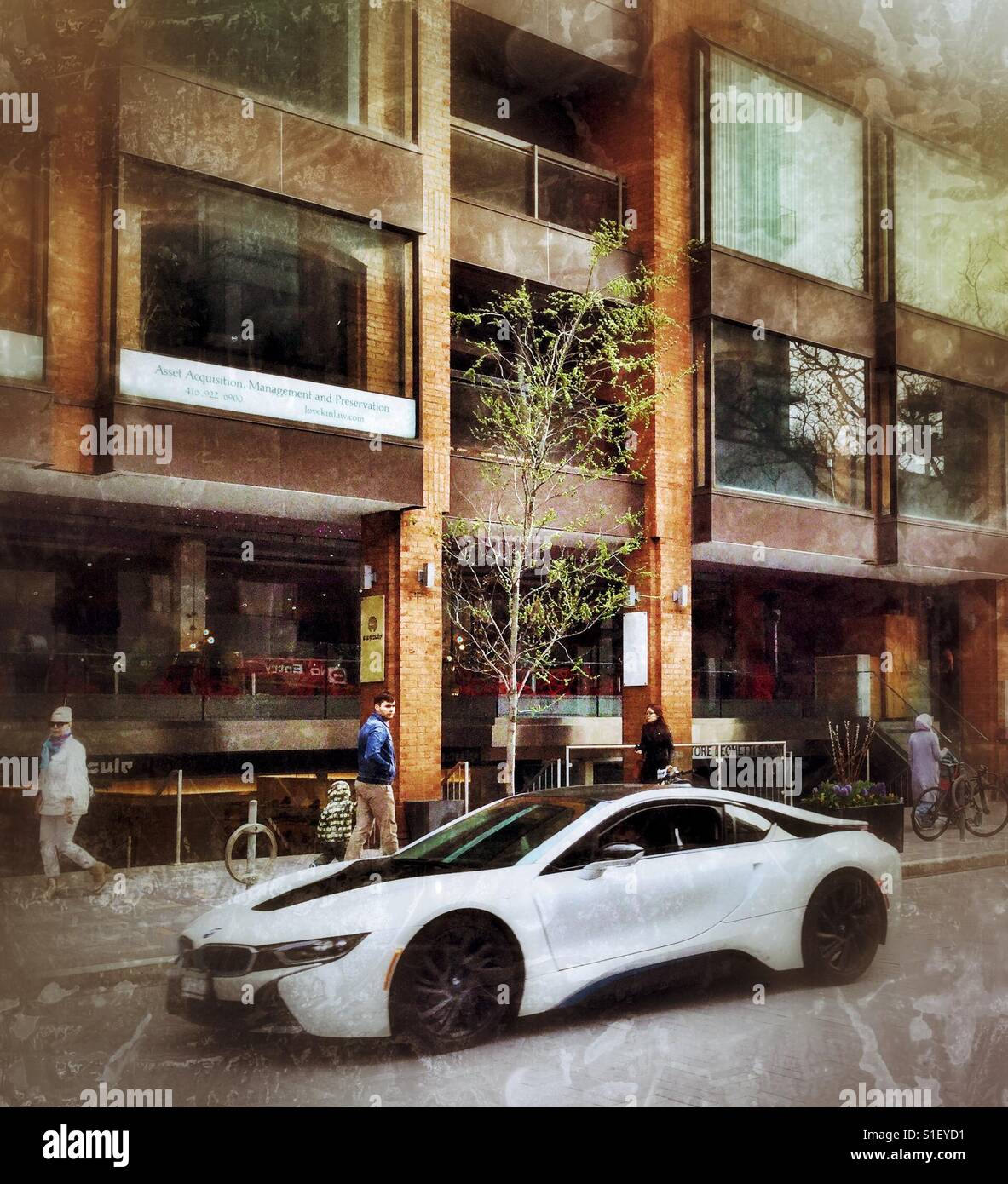 White luxury sports car on the streets of Toronto. - Smartphone Captured Stock Image