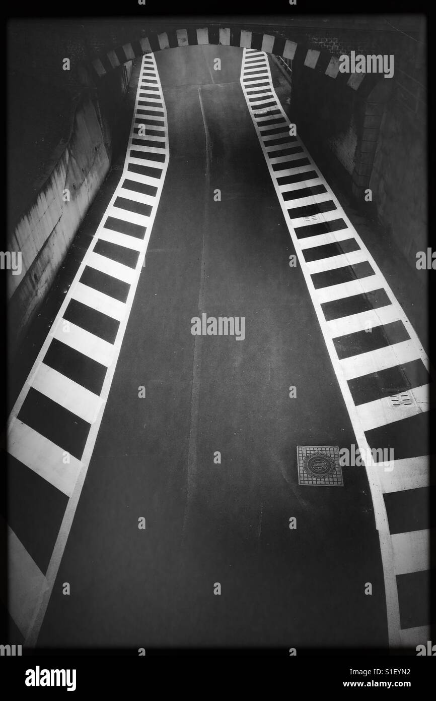 Tunnel road direction way air view signs abstract composition contrast empty bottleneck difficulty obstacles - Smartphone Captured Stock Image