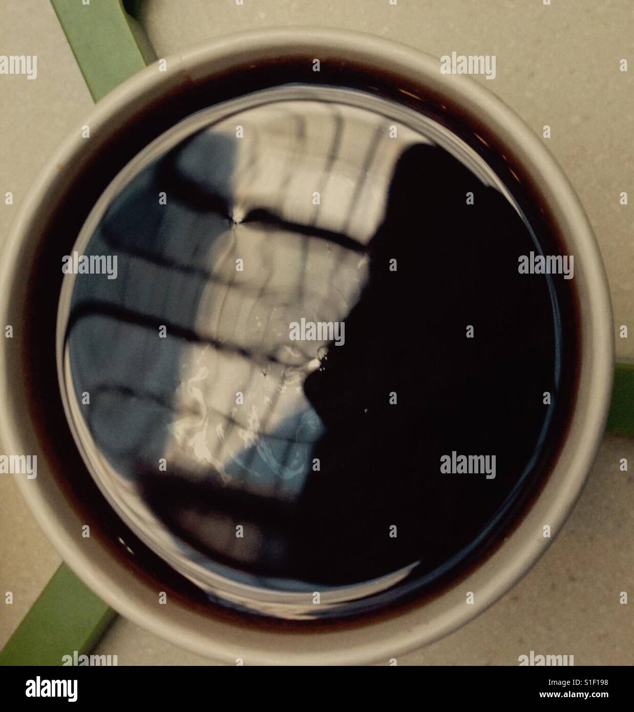 Art in my morning coffee, window reflection Stock Photo Alamy