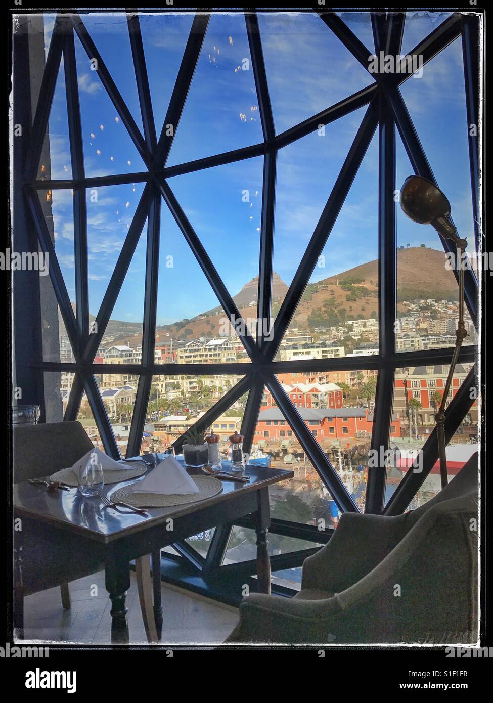 Window seat at Granary Restaurant at the Silo Hotel, Waterfront, Cape Town. - Smartphone Captured Stock Image