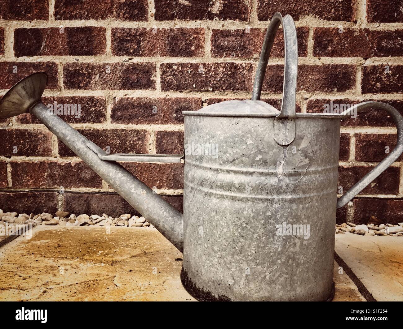 Retro watering can - Smartphone Captured Stock Image
