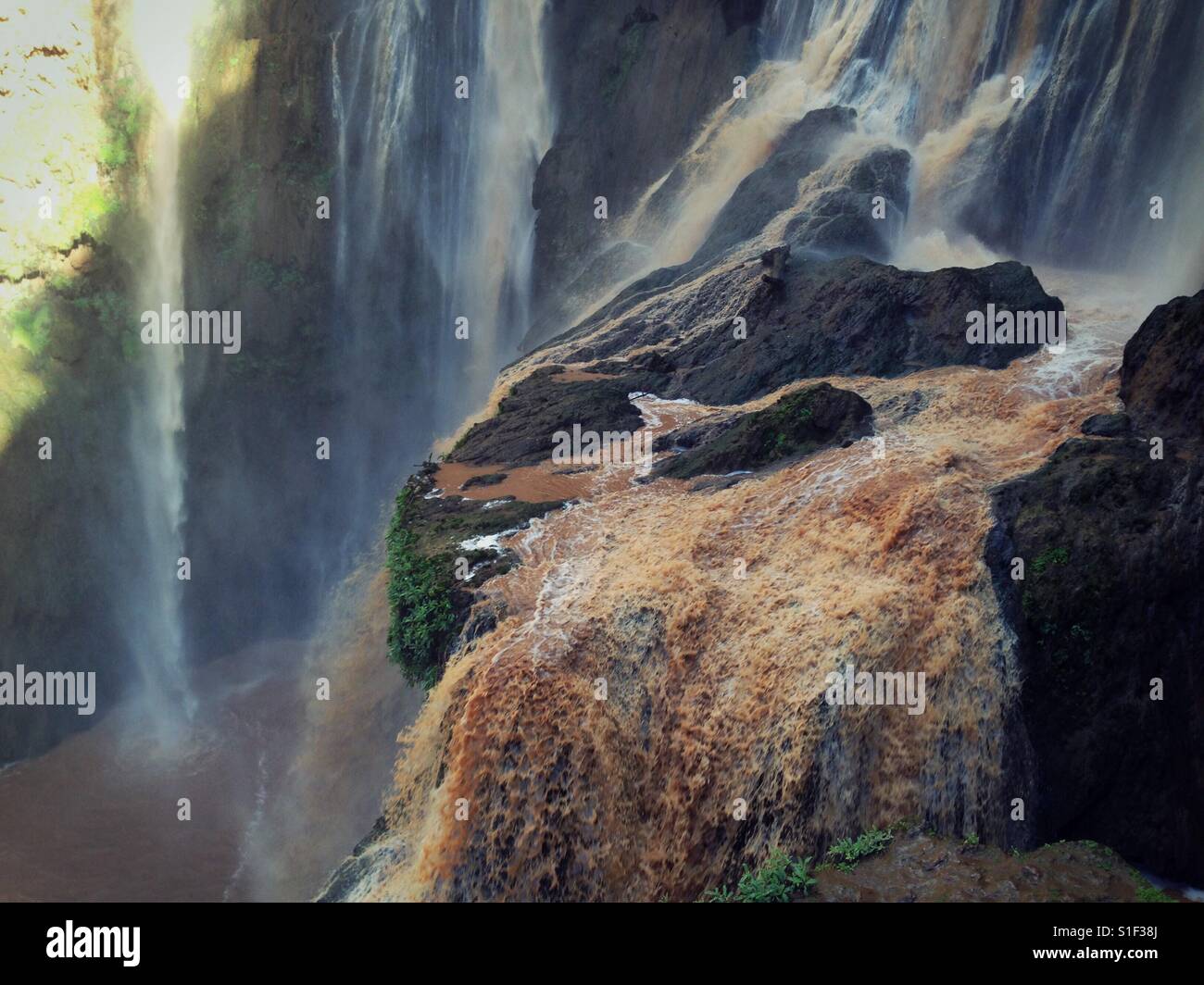 Waterfall over rocks following heavy rainstorm in Morocco - Smartphone Captured Stock Image