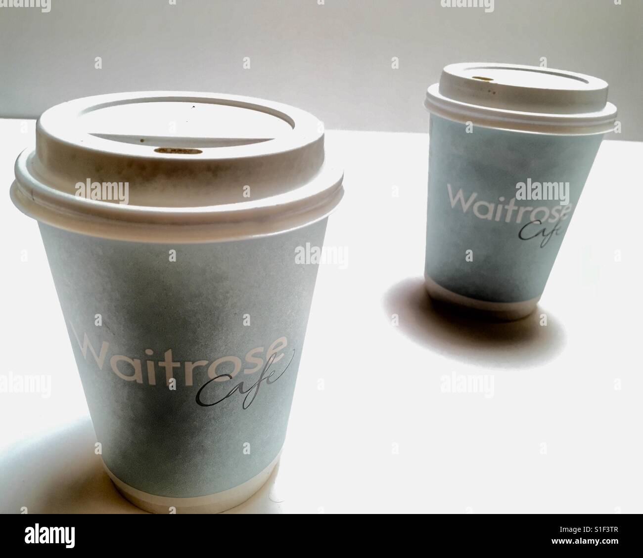 Waitrose cafe take away coffee cups - Smartphone Captured Stock Image