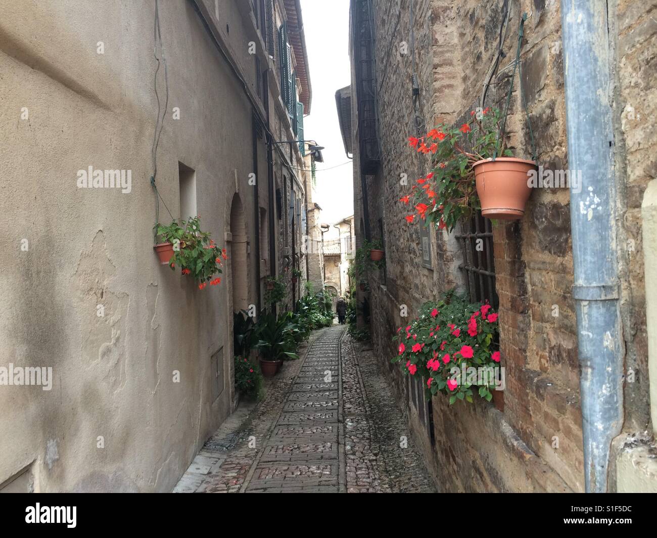 Medieval town narrow street, Umbria, Italy Stock Photo