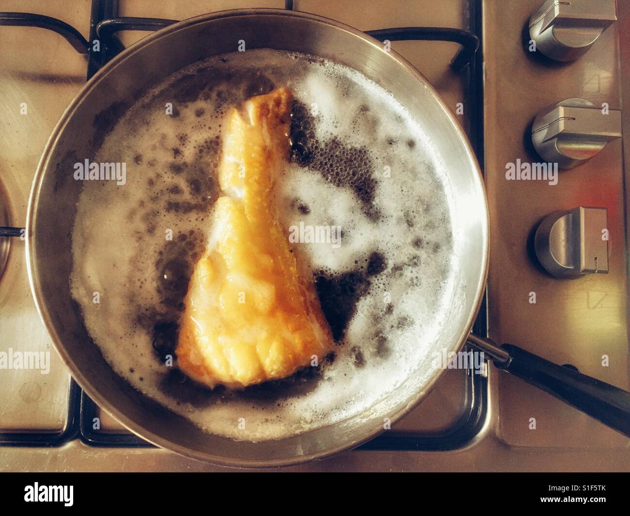 Poached smoked haddock Stock Photo Alamy