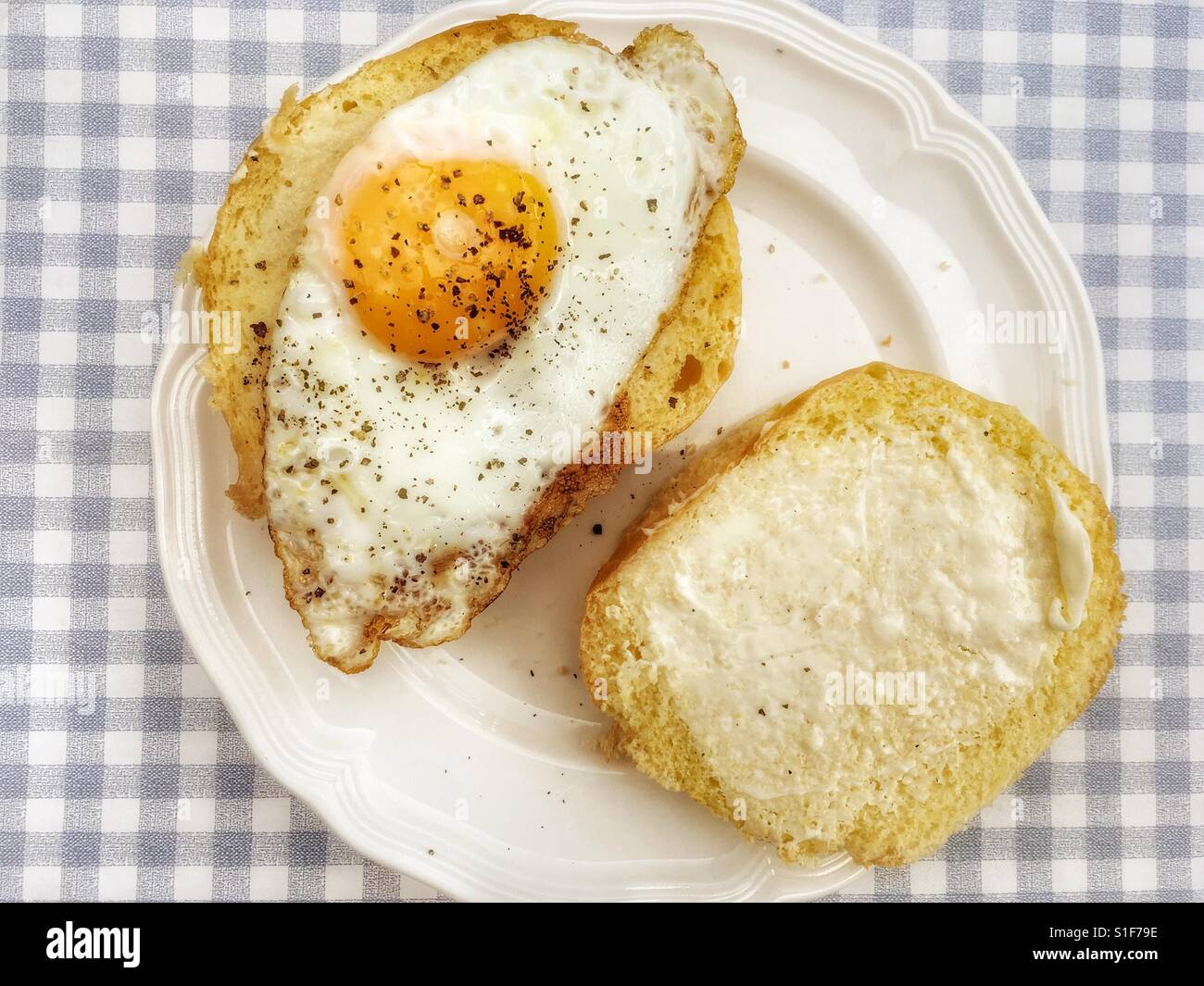 Fried egg on brioche bread bun - Smartphone Captured Stock Image