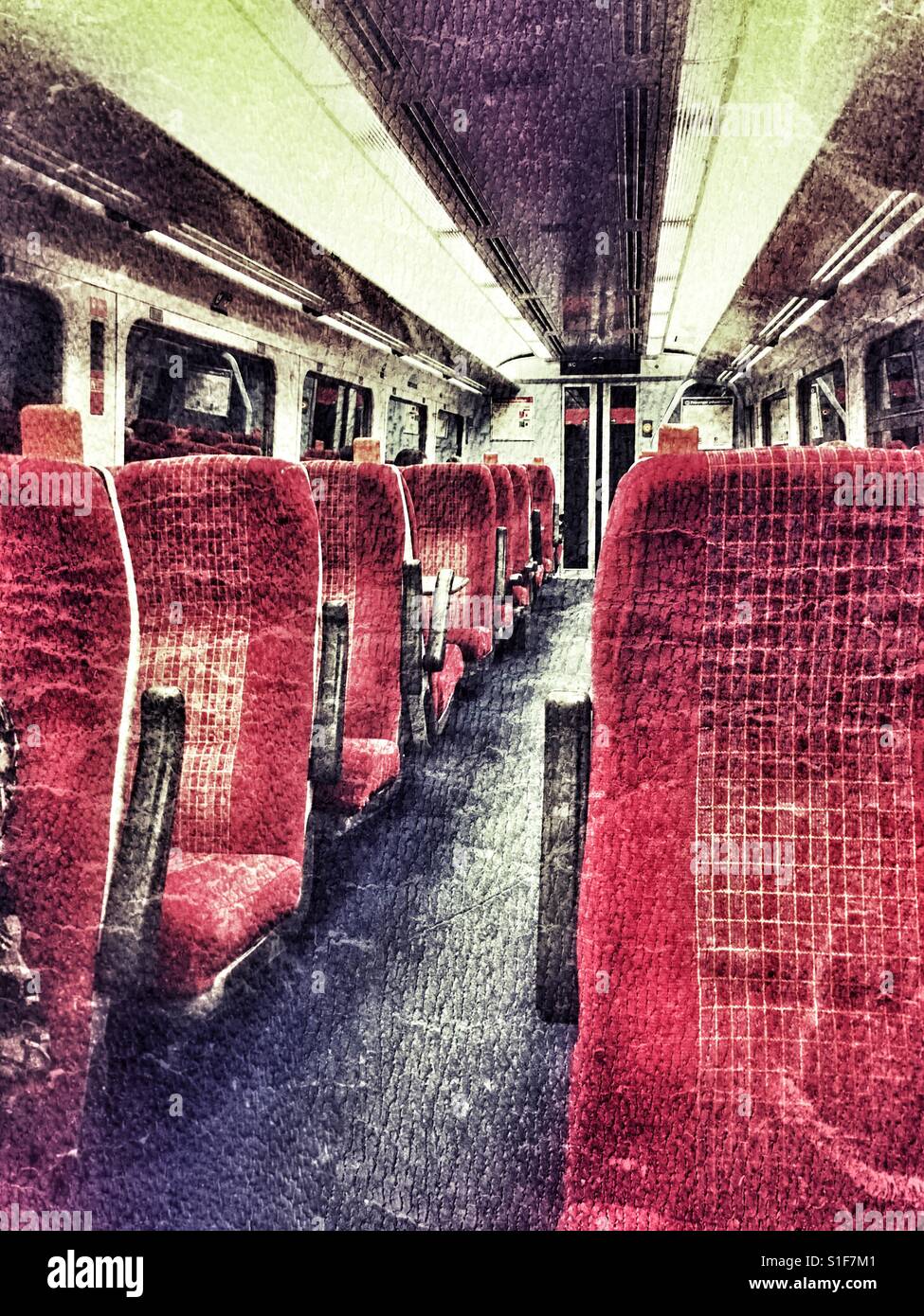 Rail carriage interior at night, nearly empty - Smartphone Captured Stock Image