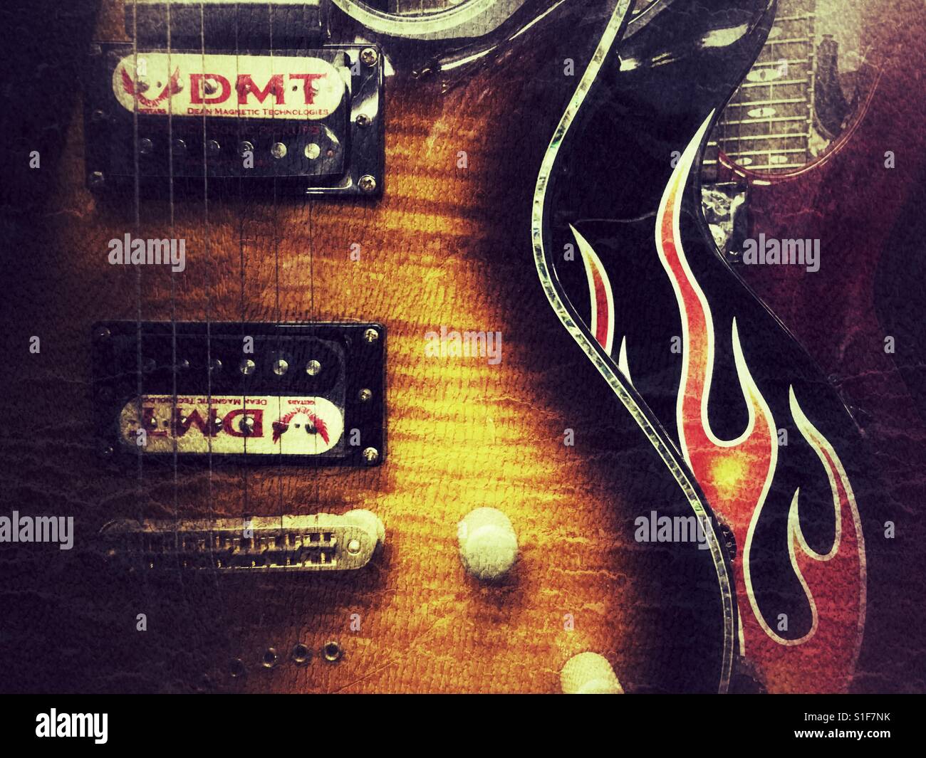 Electric guitars on display in a music shop - Smartphone Captured Stock Image