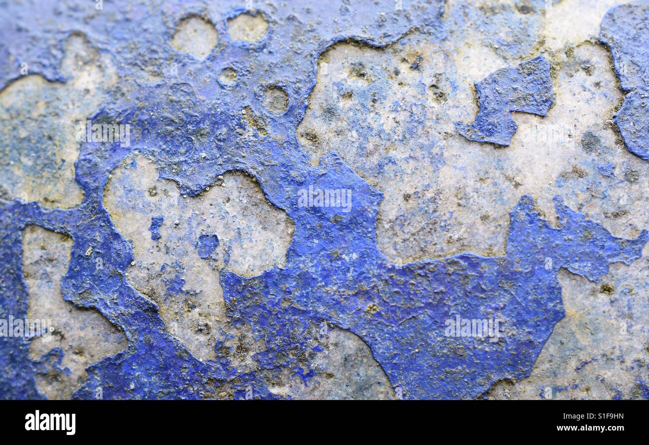 Blue Paint peeling off derelict Stone Wall Stock Photo Alamy