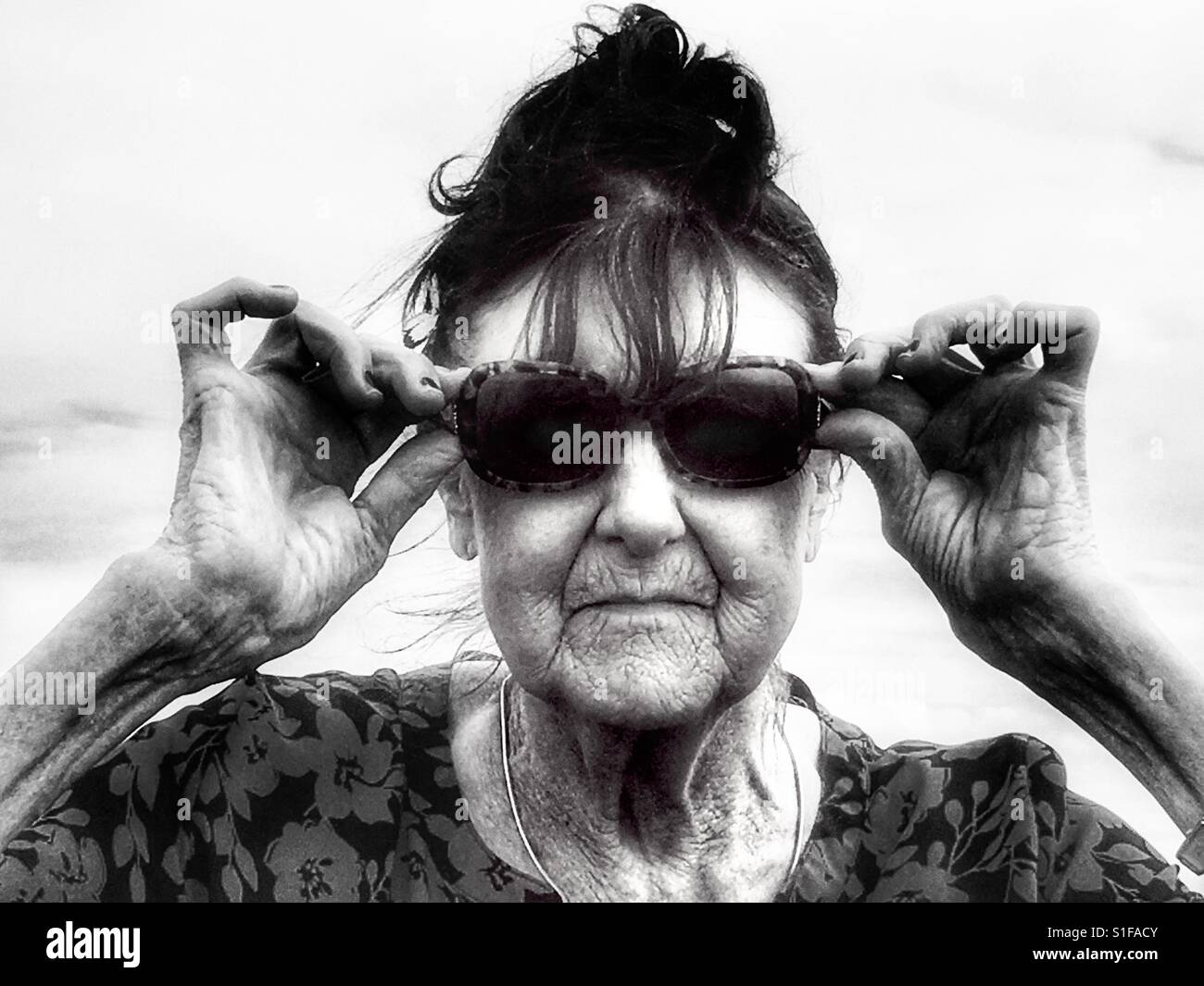 Woman wearing sunglasses - Smartphone Captured Stock Image