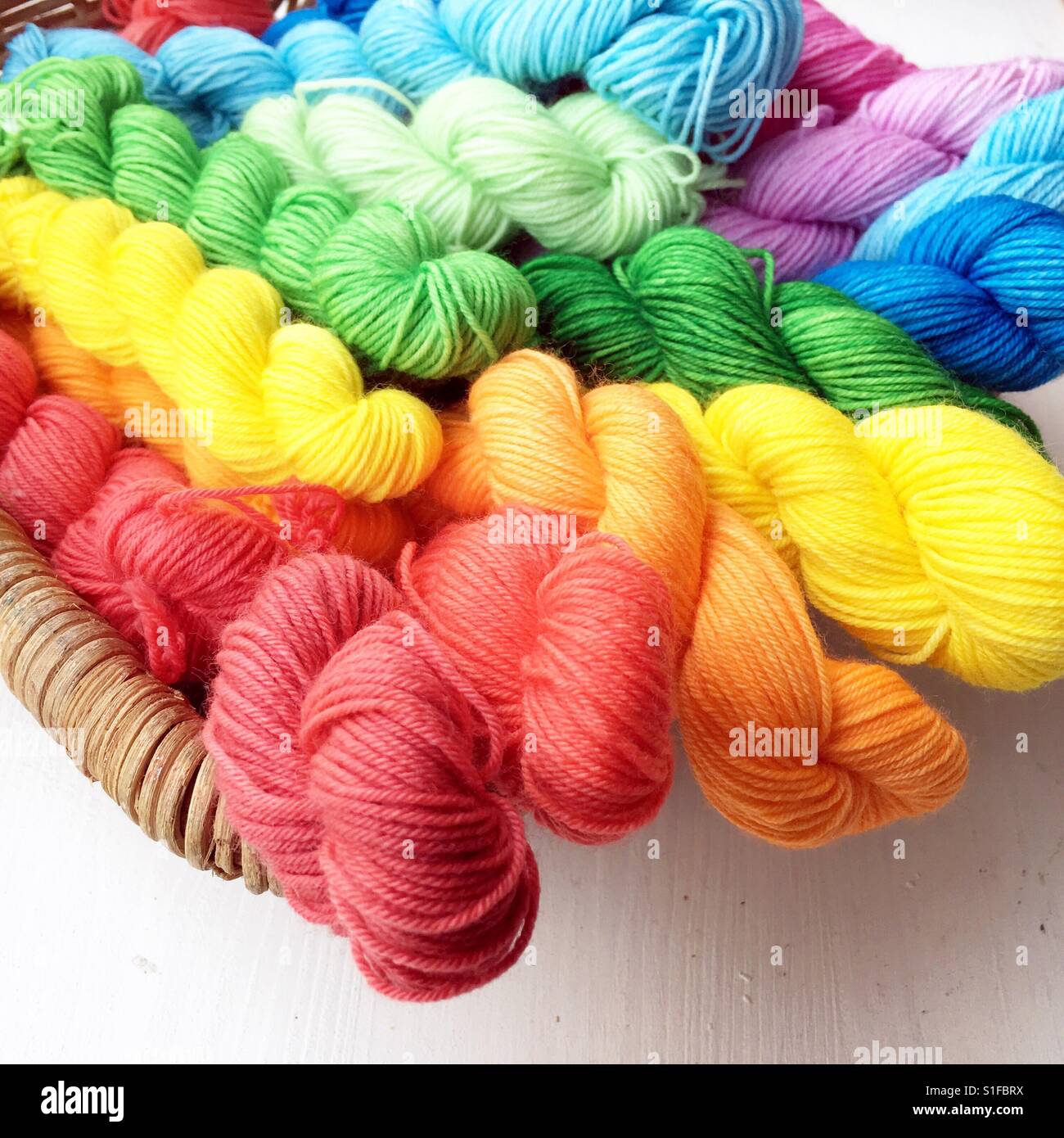 Colourful wool yarn with crocheting needles. Resolution and high quality  beautiful photo Stock Photo - Alamy