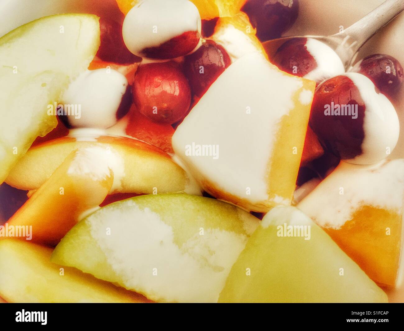 Fruit salad with low fat cream - Smartphone Captured Stock Image