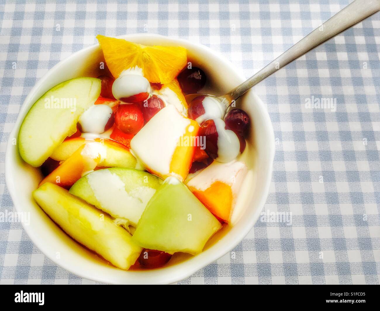 Fruit salad with low fat cream - Smartphone Captured Stock Image