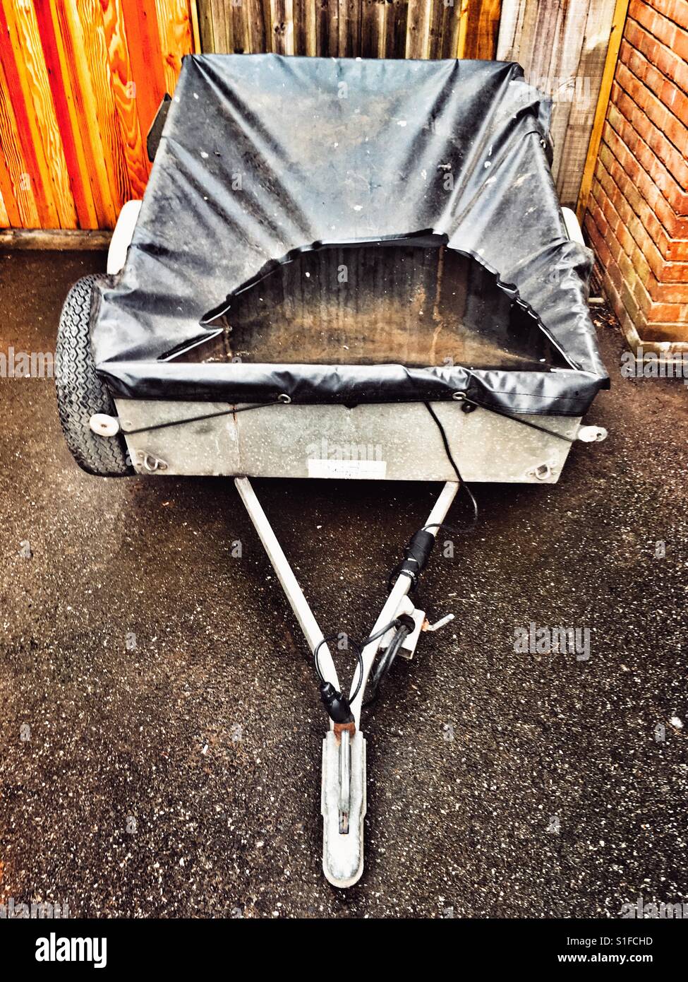 Rain filled trailer cover Stock Photo Alamy