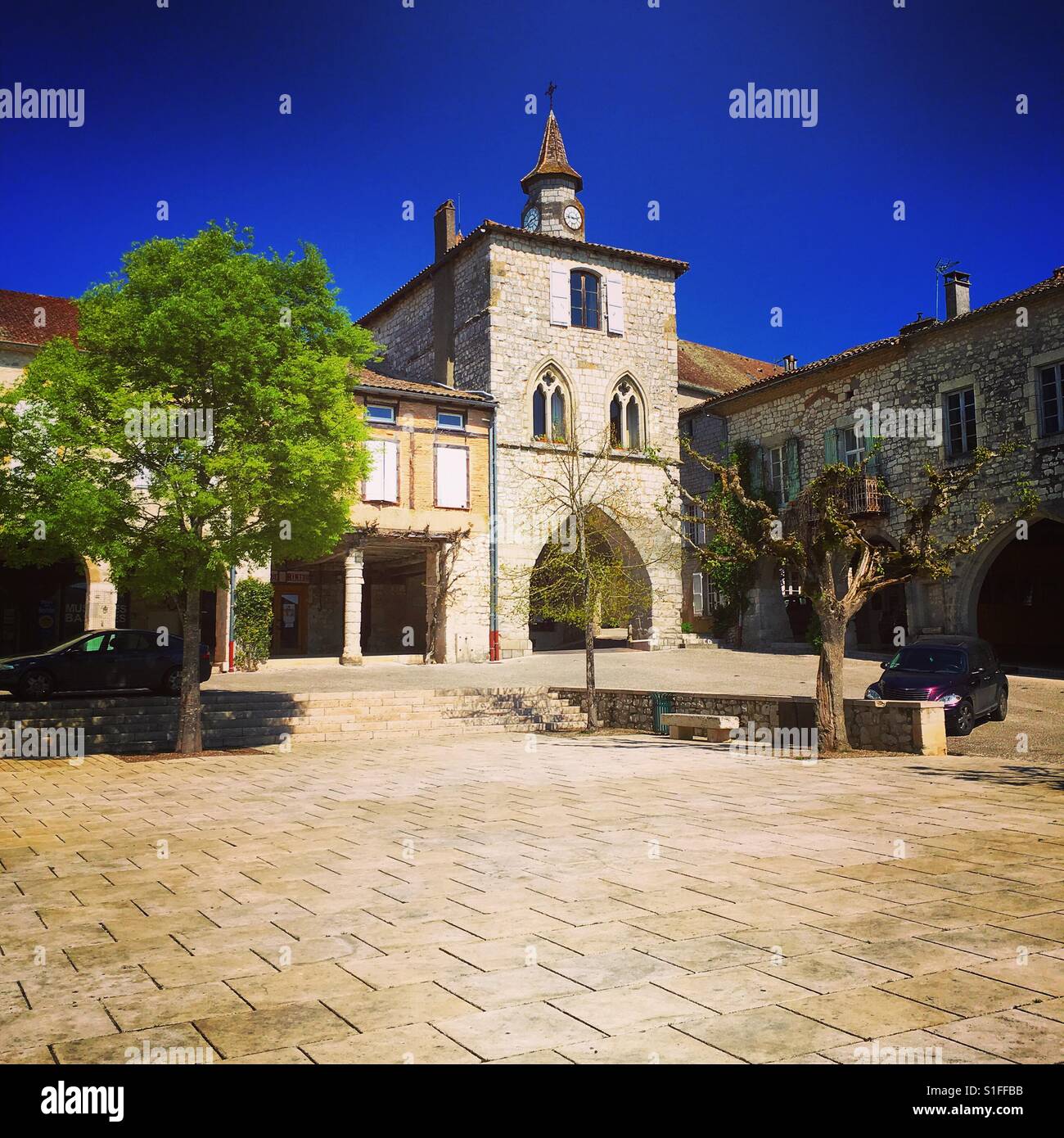 The 'House of the Black Prince' in a corner of the idyllic central square in Monflanquin, Lot-et-Garonne, France. This picturesque town is a member of  The Most Beautiful Villages of France (Les Plus Beaux Villages de France) association. Mobile phone photo with mobile device post processing. - Smartphone Captured Stock Image