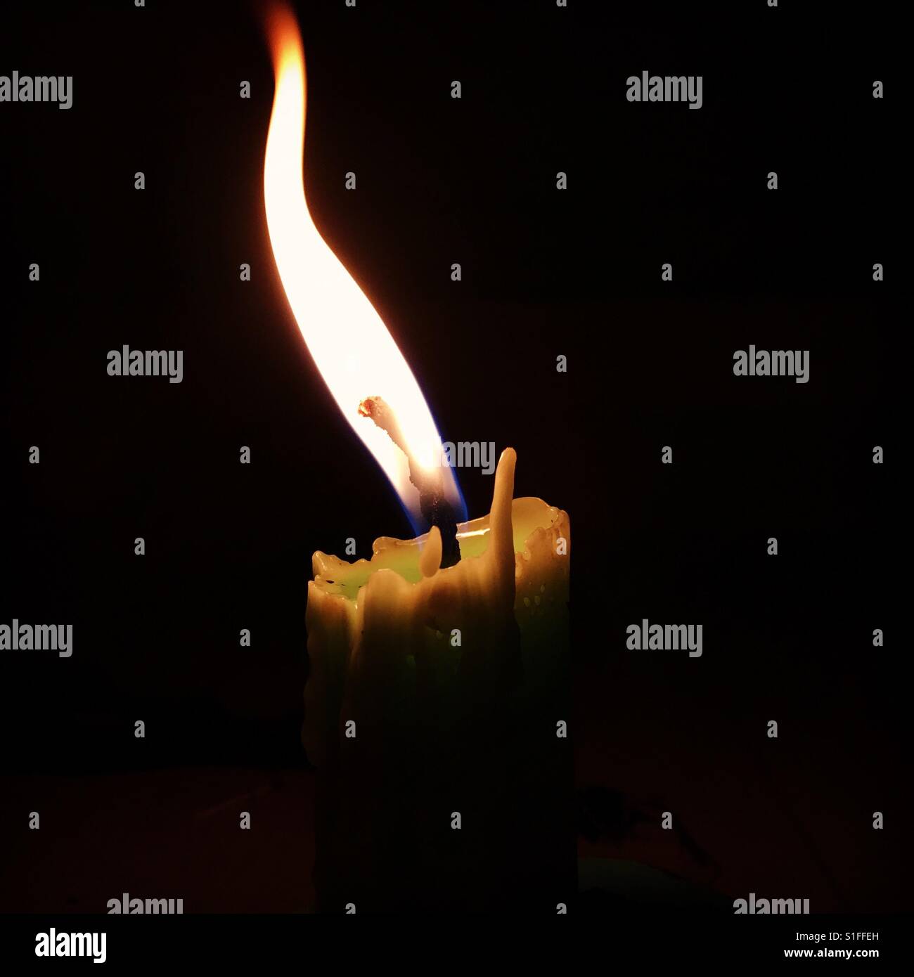 Candle light in the darkness Stock Photo Alamy