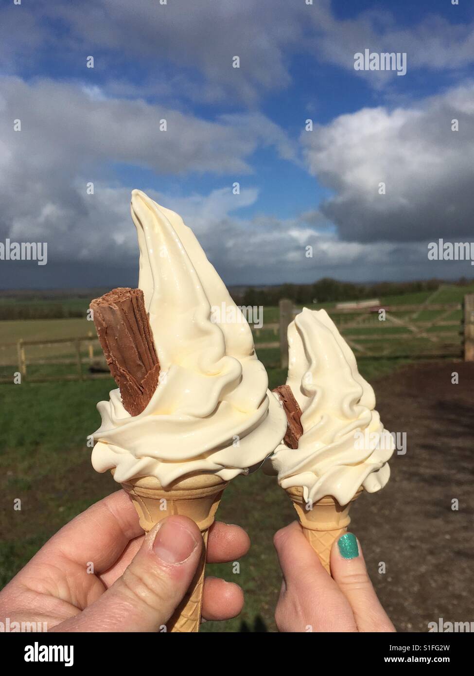 His and hers ice creams Stock Photo