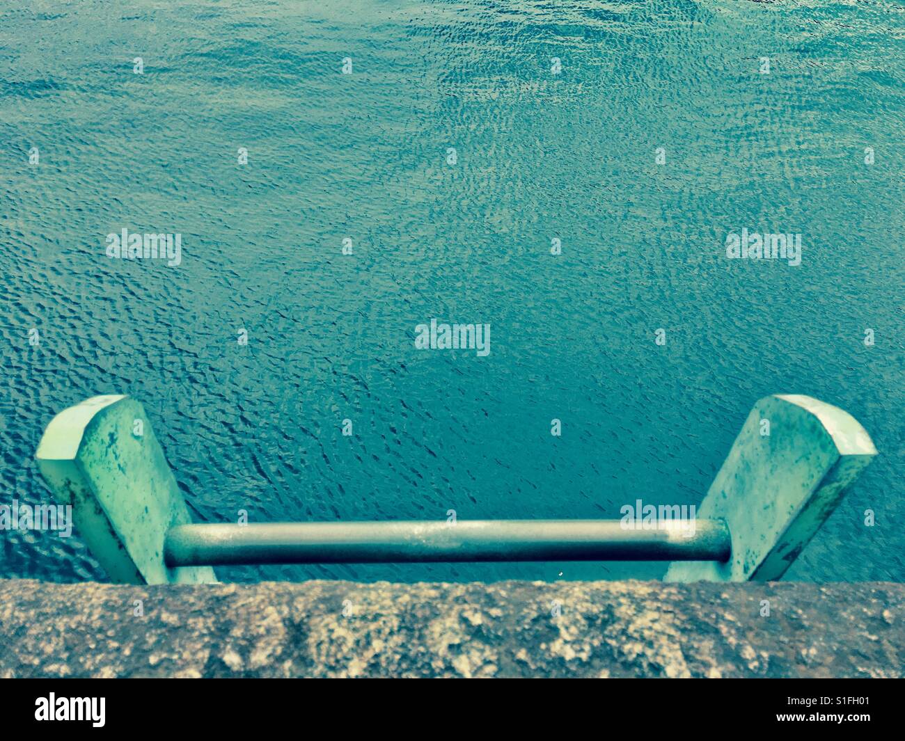 Ladder going down to the sea - Smartphone Captured Stock Image