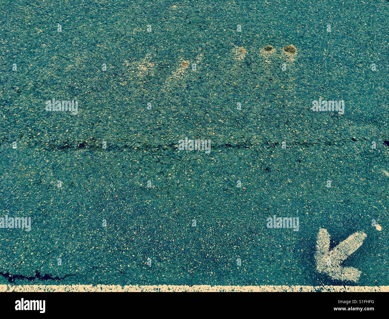 Arrow pointing left and down - Smartphone Captured Stock Image