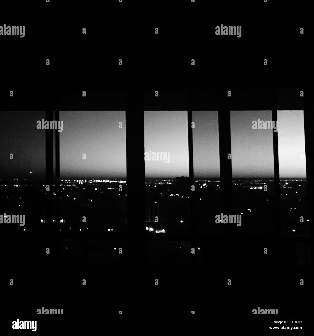 Montréal by night through windows, Canada Stock Photo