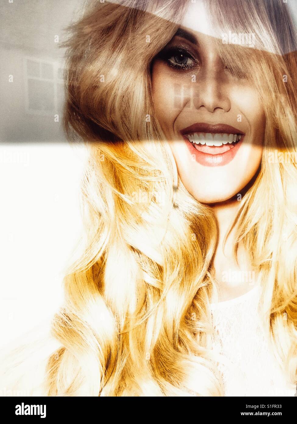 Poster in hairdressers window - Smartphone Captured Stock Image