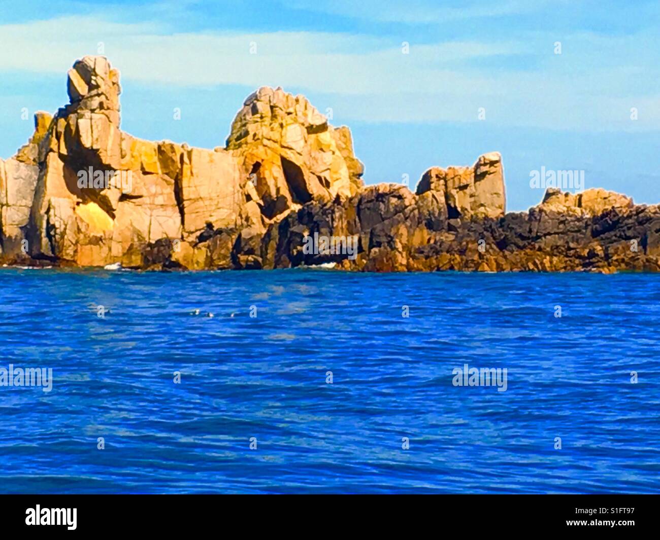 Rock formations by the sea hires stock photography and images Alamy