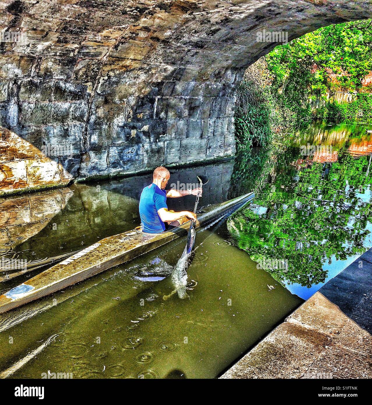 Rowing kayaking into reflection - Smartphone Captured Stock Image
