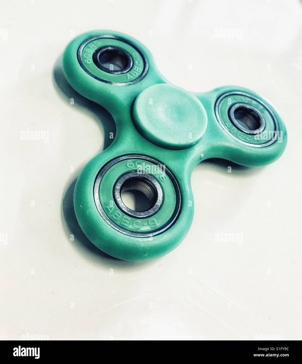 Green fidget spinner Stock Photo Alamy
