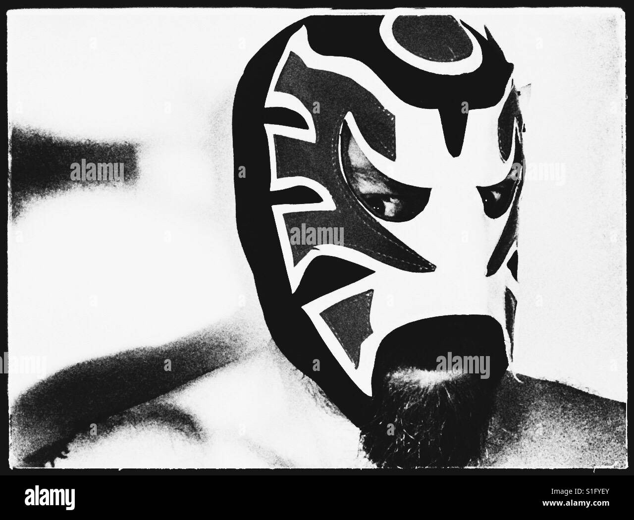 Man in Mexican Wrestling Mask. Stock Photo