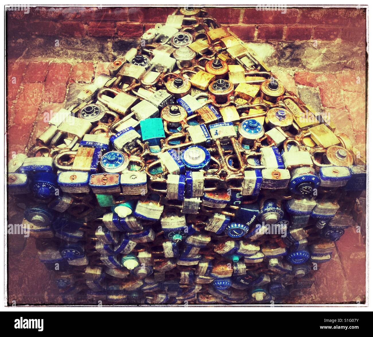 Love locks form a triangle. - Smartphone Captured Stock Image