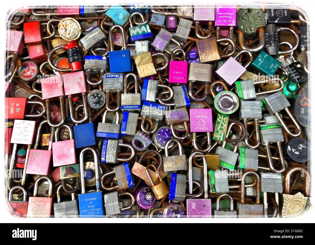 Colourful love locks in a bunch. - Smartphone Captured Stock Image