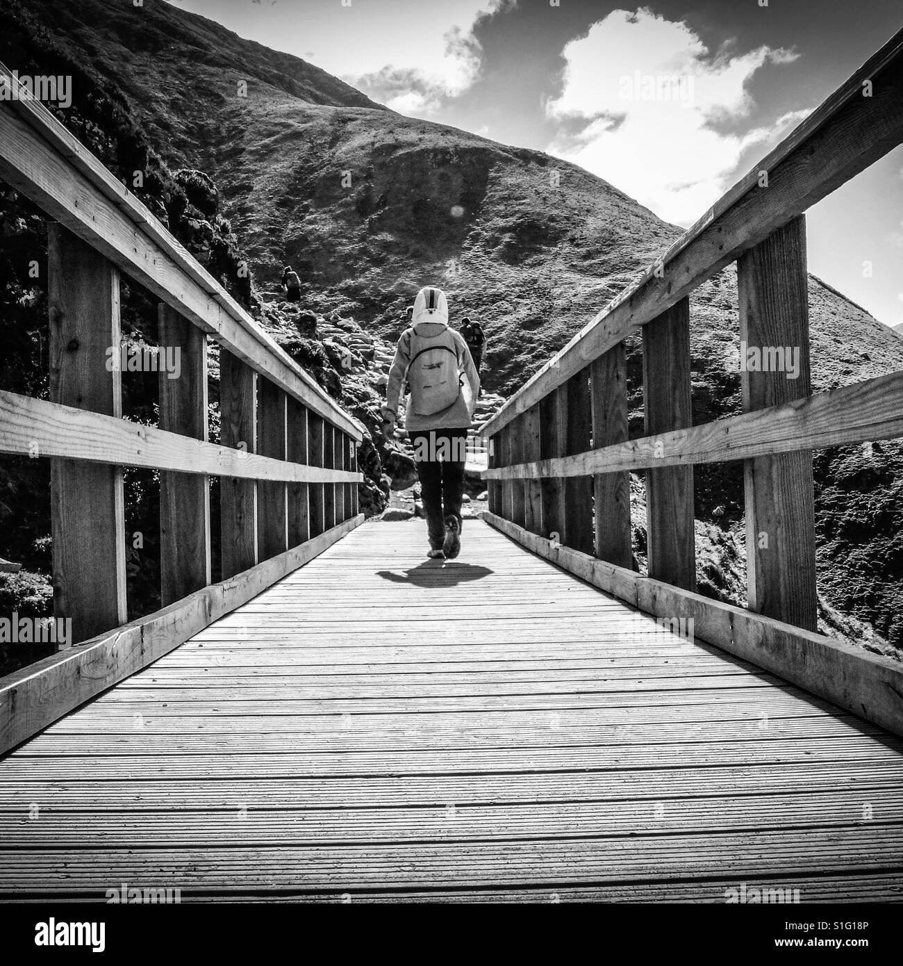 Walking across the footbridge. Up Ben Nevis, Scotland Stock Photo Alamy