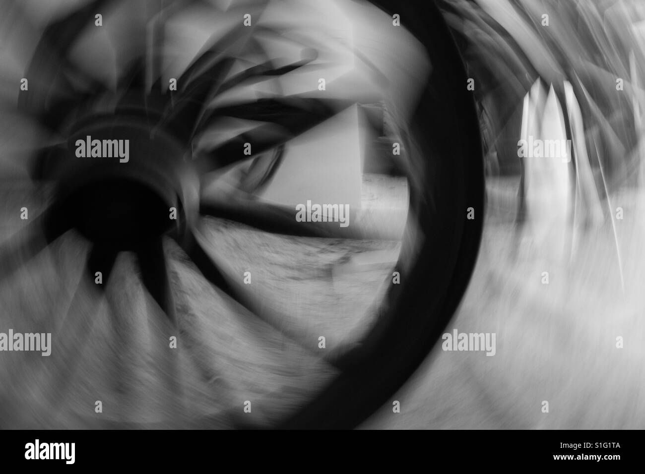 Wheels Keep On Turning Abstract antique wagon wheel Stock Photo Alamy