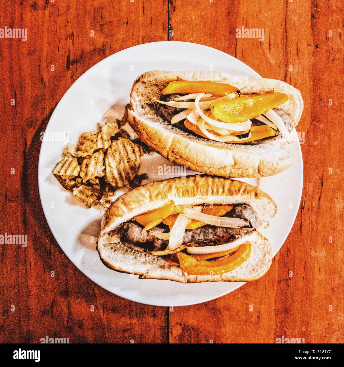 Brats and chips: game food Stock Photo