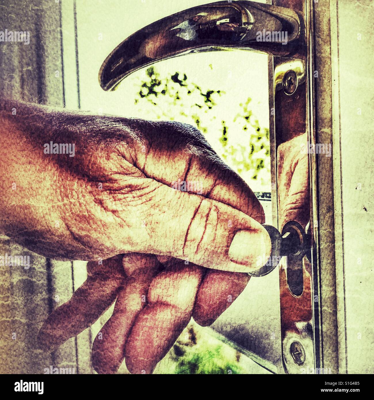 Locking a terrace door - Smartphone Captured Stock Image