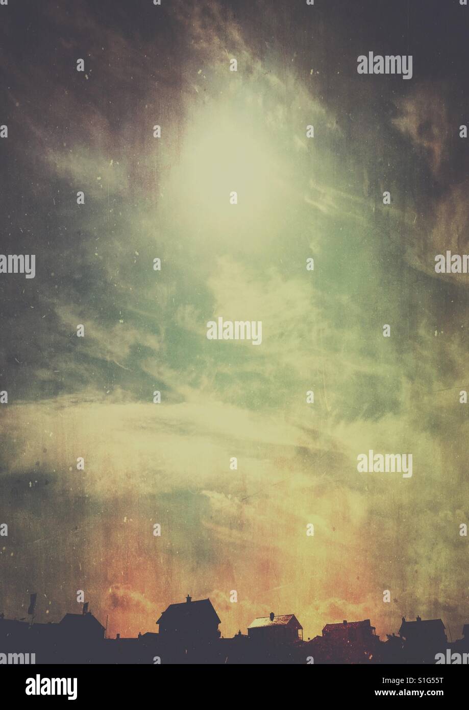 Ominous sunny sky above beach houses - Smartphone Captured Stock Image