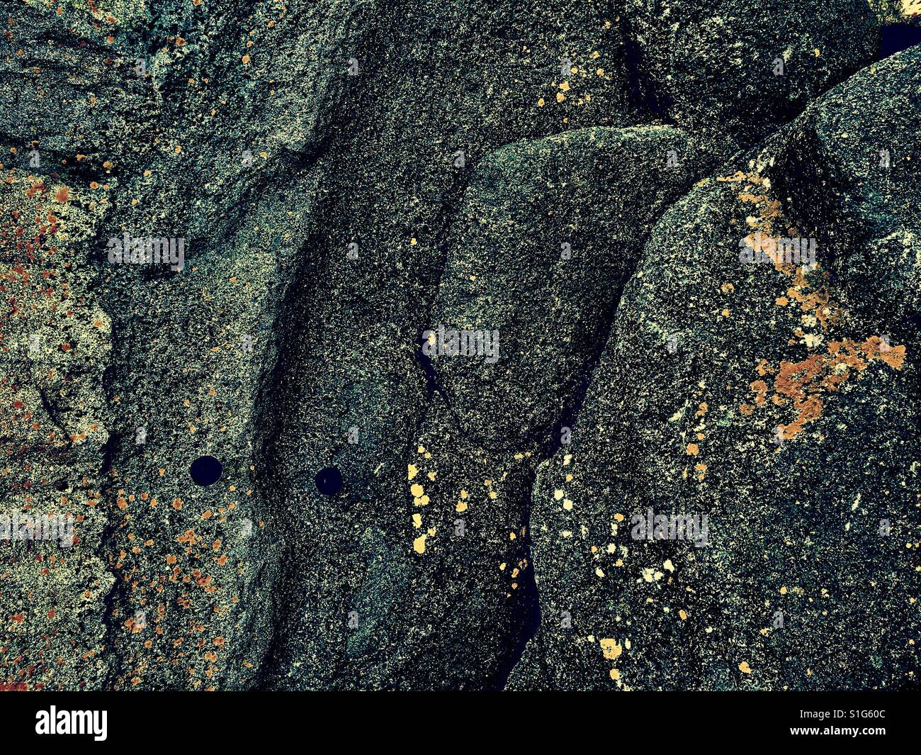 Dark black coastal rocks hi-res stock photography and images - Alamy