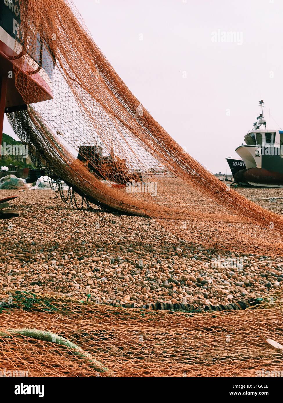 Fishermen's boats and nets in Hastings England - Smartphone Captured Stock Image