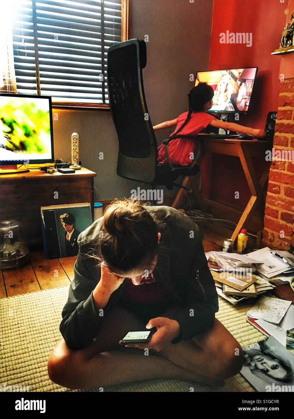 Children online - Smartphone Captured Stock Image