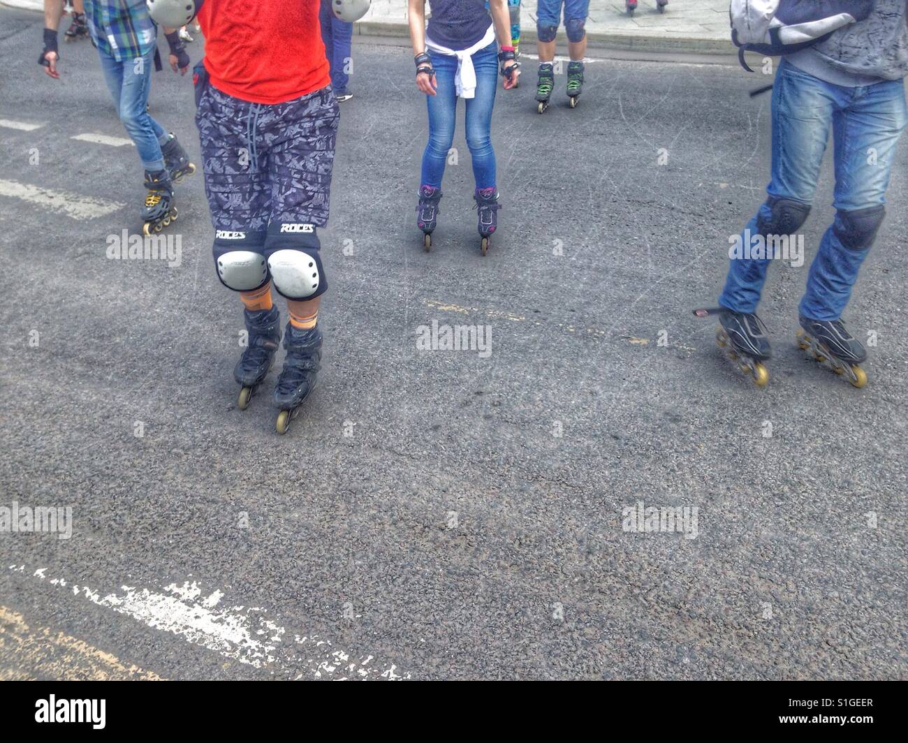 Group of teenagers on roller skates - Smartphone Captured Stock Image